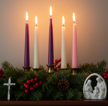 Load image into Gallery viewer, Bring warmth, tradition, and elegance to your holiday gatherings with this festive Advent bundle of pure beeswax taper candles. This set includes a beautiful 10' light pink taper, a 10" white taper and three deep purple 10" tapers (SET OF 5) —perfect for creating a classic Advent wreath or adding seasonal charm to any room. Crafted from 100% natural beeswax, each candle burns drip-free, filling your space with a soft, golden glow and a gentle, all natural,&nbsp; honey fragrance that enhances holiday décor.
