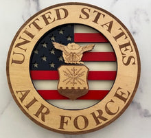 Load image into Gallery viewer, Celebrate the heroes that fought for our freedom with these Military Signs. &nbsp;These 9” round signs display a flag background and your choice of military insignias on the front. &nbsp;The perfect way to thank the veterans or active duty hero’s in your life. &nbsp;
