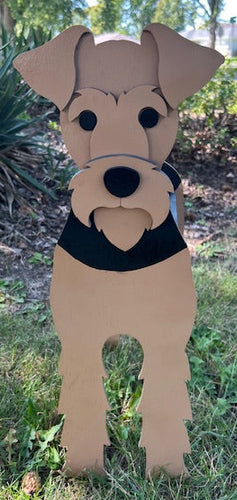 Bring some furry love to your home with our charming Airdale Dog Planter.  Not only does it welcome guests with it's adorable design, but you can also add a custom dog tag with your pet's name for an extra personal touch (additional $5).  The perfect gift for dog lovers, this planter is sure to bring a smile to anyone's face.  Get yours now and show your love for man's best friend.