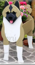 Load image into Gallery viewer, Bring some furry love to your home with our charming Akita Dog Planter.&nbsp; Not only does it welcome guests with it&#39;s adorable design, but you can also add a custom dog tag with your pet&#39;s name for an extra personal touch (additional $5).&nbsp; The perfect gift for dog lovers, this planter is sure to bring a smile to anyone&#39;s face.&nbsp; Get yours now and show your love for man&#39;s best friend.
