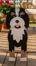 Load image into Gallery viewer, Welcome guests with a little Bernedoodle personality! Our Bernedoodle Planter Box is handmade and hand-painted to bring the lovable, fluffy look of this favorite breed to your porch, entryway, sunroom, or home.
