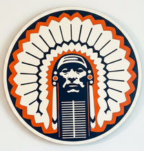Load image into Gallery viewer, A round decorative wooden wall sign featuring a stylized Native American chief with a large feathered headdress
