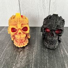 Load image into Gallery viewer, Make a bold statement with this Skull Beeswax Candle with Cross Crown, handcrafted from 100% pure American beeswax. This hauntingly detailed candle is the perfect addition to Halloween décor, gothic home décor, dark academia, witchy décor, haunted house displays, or spooky fall decorating.
