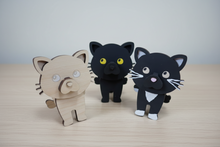 Load image into Gallery viewer, Let an adorable kitty keep watch over your glasses when you're not wearing them! Our Cat Eyeglass Holder gives your eyeglasses a cute and convenient place to rest while adding a little feline personality to your nightstand, dresser, desk, or reading area.
