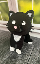Load image into Gallery viewer, Let an adorable kitty keep watch over your glasses when you're not wearing them! Our Cat Eyeglass Holder gives your eyeglasses a cute and convenient place to rest while adding a little feline personality to your nightstand, dresser, desk, or reading area.
