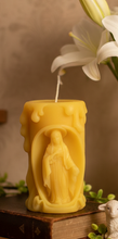 Load image into Gallery viewer, Celebrate your faith with these beautifully handcrafted Religious Beeswax Candles, featuring four timeless Christian designs that honor the life and love of Christ. Each candle is intricately detailed and depicts one of four cherished Biblical scenes:
