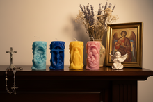 Load image into Gallery viewer, Celebrate your faith with these beautifully handcrafted Religious Beeswax Candles, featuring four timeless Christian designs that honor the life and love of Christ. Each candle is intricately detailed and depicts one of four cherished Biblical scenes:
