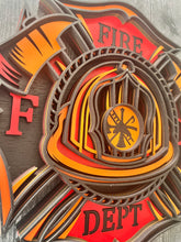 Load image into Gallery viewer, Honor the courage, dedication, and tradition of the fire service with this striking 5-layer Fire Department sign. Designed in the classic Maltese cross shape, this dimensional wood sign features a detailed firefighter helmet surrounded by crossed axes and bold “FIRE DEPT” lettering.
