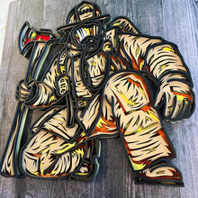 Load image into Gallery viewer, Honor the bravery, strength, and dedication of a firefighter with this striking 4-layer wooden firefighter sign. Featuring a firefighter in full turnout gear and breathing apparatus, kneeling beside a detailed fire axe, this piece captures the courage and determination of those who answer the call.

