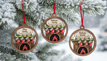 Load image into Gallery viewer, Celebrate everyone who makes your house a home with this beautiful Personalized Family Christmas Ornament. Featuring a cozy fireplace scene, personalized stockings, and your family name on the mantel, this hand-painted keepsake is a special way to celebrate your family at Christmas.
