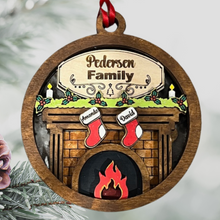 Load image into Gallery viewer, Our exquisite Fireplace Ornament with Personalized Stockings &amp; Family Name on mantle – the perfect addition to your holiday décor that captures the essence of family warmth and festive joy. Transform your Christmas tree into a cherished symbol of togetherness with this beautifully crafted keepsake ornament.
