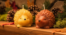 Load image into Gallery viewer, Bring the charm of the forest into your home with this adorable Hedgehog Beeswax Candle! Available in two delightful poses—standing upright or with all four paws on the ground—these highly detailed woodland candles are the perfect addition to any nature-inspired décor.
