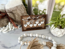 Load image into Gallery viewer, This gorgeous Family Tree Sign is a beautiful and meaningful way to celebrate and honor your family heritage.  This personalized frame can be customized with up to 25 names, allowing you to create a unique and special representation of your family.  
