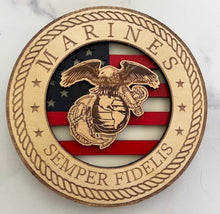 Load image into Gallery viewer, Celebrate the heroes that fought for our freedom with these Military Signs. &nbsp;These 9” round signs display a flag background and your choice of military insignias on the front. &nbsp;The perfect way to thank the veterans or active duty hero’s in your life. &nbsp;
