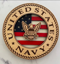 Load image into Gallery viewer, Celebrate the heroes that fought for our freedom with these Military Signs. &nbsp;These 9” round signs display a flag background and your choice of military insignias on the front. &nbsp;The perfect way to thank the veterans or active duty hero’s in your life. &nbsp;
