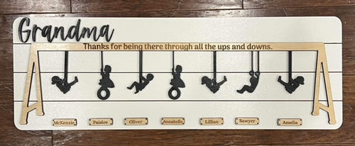 Add your children's names to this adorable Grandparents Swing Set Sign to create a lasting heirloom your loved ones will treasure.  This adorable sign reads 'Thanks for being there through all the ups and downs' with children swinging below with their names.  