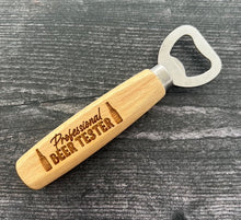 Load image into Gallery viewer, Pop open your favorite beverage in style with our engraved wood-handled bottle openers! Crafted with a durable stainless steel opener and a smooth wooden handle, these openers offer a comfortable grip and a sleek, rustic look.
