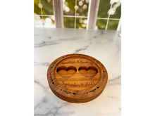 Load image into Gallery viewer, Elevate the presentation of your wedding rings with our exquisite Personalized Ring Bearer Box – the perfect alternative to the traditional ring bearer pillow. This 6&quot; round box is designed to add an extra touch of elegance to your wedding ceremony
