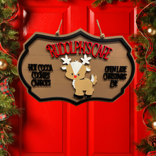 Load image into Gallery viewer, Give your decor a festive twist with this Rudolph&#39;s Cafe sign.&nbsp; This adorable sign adds a touch of whimsey to any coffee bar or kitchen area offering Hot Cocoa, Cookies, and Carrots &amp; adds that you&#39;re Open Late Christmas Eve.
