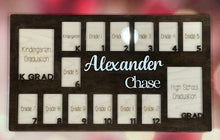 Load image into Gallery viewer, Proudly display your child’s school journey from Kindergarten through High School Graduation all in one beautiful frame. This thoughtfully designed photo frame creates a timeless keepsake you’ll treasure for years to come—watching your child grow, one school year at a time.
