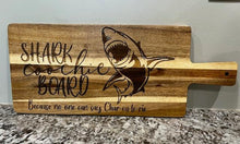 Load image into Gallery viewer, Add some laughter to your next party with this Shark Coochie Board.&nbsp; Engraved with a shark, this charcuterie board reads Shark Coochie Board, Becuase no one can say Char-cu-te-rie.
