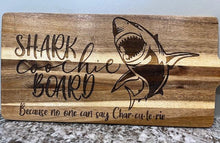 Load image into Gallery viewer, Add some laughter to your next party with this Shark Coochie Board.&nbsp; Engraved with a shark, this charcuterie board reads Shark Coochie Board, Becuase no one can say Char-cu-te-rie.
