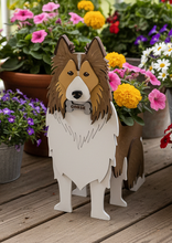 Load image into Gallery viewer, Welcome friends and family with this beautiful handcrafted Sheltie (Shetland Sheepdog) Planter Box! This charming decorative piece is the perfect addition to your front porch, entryway, covered patio, or home décor. It's a wonderful gift for Sheltie owners, dog lovers, birthdays, housewarmings, or any special occasion.
