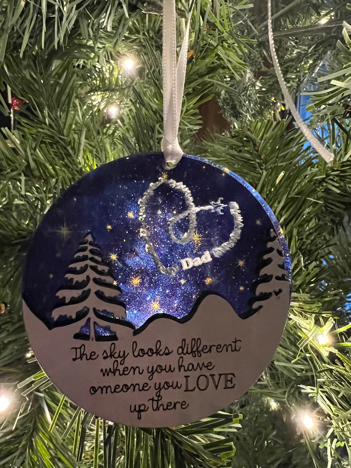 This beautiful The Sky Looks Different ornament is sure to become a cherished memorial to those we love.  The background is made of transparent blue acrylic or stary sky acrylic to allow the light to shine through the ornament for a beautiful remembrance.  Available in 2 styles and may be customized.