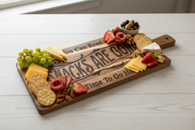 Load image into Gallery viewer, Add some laughter to your next party with this If you can read this the SNACKS ARE GONE and it's time to go home Charcuterie Board.&nbsp;&nbsp;

This exquisite Acacia Wood Cutting Board, a versatile and stylish addition to your kitchen or entertaining space. Crafted from high-quality acacia wood, this cutting board not only provides a durable surface for all your slicing and dicing needs but also doubles as a charming charcuterie board for serving appetizers with flair.
