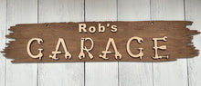 Load image into Gallery viewer, Transform your workshop into a space that truly reflects your craftsmanship with our extraordinary Workshop Sign. Welcome one and all to your creative haven and personalize this sign with your favorite craftsman&#39;s name prominently displayed at the top.

