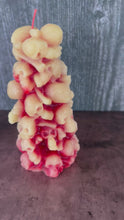 Load and play video in Gallery viewer, Unleash the spooky vibe with our one-of-a-kind bleeding skull beeswax candle. As it burns, watch in awe as the 'blood' oozes and the skulls roll off onto the plate, adding an eerie touch to your Halloween decorations. The glowing eyes and piles of skulls and bones make this pillar candle a must-have for gothic and fall decor. Perfect for gifting to skull-loving friends or for adding a touch of horror to any room. Get yours now and bring the creepy factor to your home!
