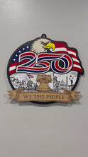 Load and play video in Gallery viewer, Celebrate America’s 250th Anniversary with this stunning layered laser cut sign, a patriotic tribute to the spirit, strength, and history of the United States. Featuring a majestic bald eagle soaring over a flowing American flag, this eye-catching piece also includes a beautifully engraved scene showcasing iconic American landmarks and heritage-inspired details. 
