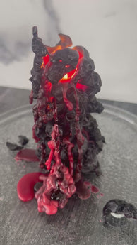 Unleash the spooky vibe with our one-of-a-kind bleeding skull beeswax candle. As it burns, watch in awe as the 'blood' oozes and the skulls roll off onto the plate, adding an eerie touch to your Halloween decorations. The glowing eyes and piles of skulls and bones make this pillar candle a must-have for gothic and fall decor. Perfect for gifting to skull-loving friends or for adding a touch of horror to any room. Get yours now and bring the creepy factor to your home!