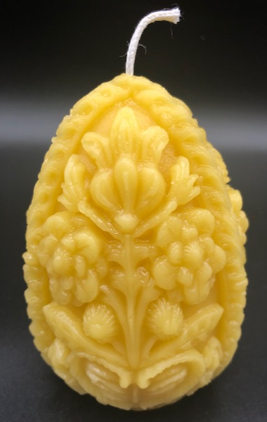 This very ornate, carved beeswax egg candles are sure to delight your guests and add a beautiful touch to Easter centerpieces.  Perfect for Easter gifts!