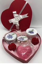 Load image into Gallery viewer, Unique Valentines Day Gift in red, heart shaped gift box. Set includes 1 Lavender Body Butter, 1 Lavender Lotion Bar, 1 Lavender Bath Bomb, 1 Lavender or Rose Geranium scented Heart Shaped Goat&#39;s Milk Soap &amp; 2 Beeswax Red Rose Ball Candles. Perfect for Valentines Day Gifts!
