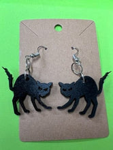 Load image into Gallery viewer, Add a bit of Halloween flare to any outfit with these Black Cat Earrings!  The perfect way to welcome in the Halloween season or a fantastic gift for your cat loving friends.
