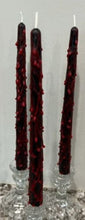 Load image into Gallery viewer, Add that extra bit of creepy to your Halloween decor with these 10&quot; Bloody Black Taper Beeswax Candles.  Drops &amp; smears of blood decorate the outside of these incredible tapers.  Perfect for your Halloween party!
