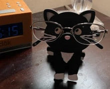 Load image into Gallery viewer, Let his adorable little kitty keep your eyeglasses safe while you sleep.  Glasses rest across the cat&#39;s nose.  These Eyeglass holders are a MUST for children &amp; adults alike.  Keep your glasses safe from scratches.  Also makes a great gift!
