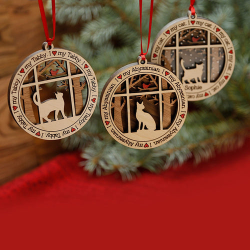 Share the love for our furry friends with these beautiful cat ornaments!  100 different options available.  Send us the name you'd like personalized on it & we'll add it to your ornament.  Our standard background is the trees with the cardinal in them.  If you'd like a different background, please contact us.