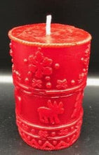 Load image into Gallery viewer, A great addition to any holiday decor, this Christmas Beeswax Pillar Candle is decorated with snowflakes, Christmas trees and cute little moose. Makes a wonderful gift, addition to your Christmas decor, or as a centerpiece. Available in red, green or natural yellow beeswax.
