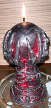 Load image into Gallery viewer, Our Witch Holding a Crystal Ball Beeswax Candle is an enchanting addition to any witchy, gothic or Halloween decor!  The intricate detailing around the base of the candle features decorative skulls.  The witch hand is adorned with bracelets, rings &amp; long, sharp fingernails adding to the eerie vibe of this incredible beeswax candle.  
