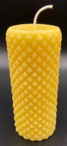 Beautiful diamond pattern on the outside of this beeswax pillar candle is sure to light up any room.  Perfect for housewarming gifts, birthday gifts or centerpieces.
