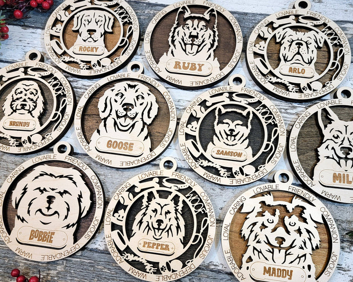 Share the love for our furry friends with these beautiful dog ornaments! 115 Breeds available. Personalize with your pets name at no extra charge. Adorable dog image in the middle surrounded by a dog bone, a ball, a dog food bowl, a leash, a collar, the word Woof, and a poop image with a smile. Around the outer edge it reads lovable, caring, loyal, adorable, warm, dependable, joyous, companion, and friendly. A great gift for any dog lover!