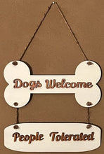 Load image into Gallery viewer, Welcome our furry friends into your home &amp; add a bit of humor to your entryway with this Dogs Welcome, People Tolerated sign.  Perfect for any dog lover!  Also makes a wonderful birthday or holiday gift.  
