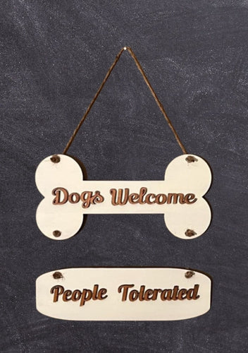 Welcome our furry friends into your home & add a bit of humor to your entryway with this Dogs Welcome, People Tolerated sign.  Perfect for any dog lover!  Also makes a wonderful birthday or holiday gift.    Approx. Size 12