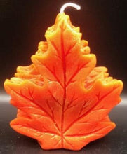 Load image into Gallery viewer, Get ready for the leaves changing colors &amp; crisp fall days with this beautiful Fall Leaves Beeswax Candle.  Adds a beautiful touch to centerpieces, Thanksgiving decor or Halloween decor.  Available in orange, burgundy or yellow with a sparkly center.  
