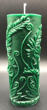 Load image into Gallery viewer, Elegant all natural beeswax pillar candle with fern leaves and fiddleheads adorning the sides. Handmade in the USA.  Green shown.  Also available in natural yellow beeswax.
