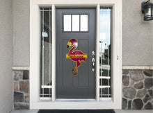Load image into Gallery viewer, Welcome everyone to your home with summer with this whimsical flamingo door hanger!  This adorable flamingo will add that special touch of summer to your entryway.  Available with a ocean blue background or a yellow overlay.
