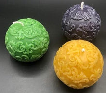 Load image into Gallery viewer, Fleur de Lis Beeswax Ball Candles in fun Mardi Gras colors of purple, green &amp; gold.
