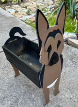 Load image into Gallery viewer, Let this adorable German Shepherd Dog Planter box help welcome guests to your home.  Custom dog tags with your dogs name also available (please message us - adds $5 to cost of planter box).  Great gift for the dog lovers in your life!
